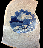 Pearlware Canova shape handled cup printed underglaze in medium blue. One of two matching cups from this assemblage. 3.5” rim diameter; 2.25” vessel height. Middle image is cup interior. Image on right, a plate, whose pattern is called "The Footbride," is from a private collection.